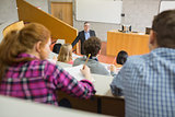 Teacher with students at the lecture hall