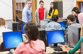 Teacher and students in the computer room