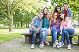 Portrait of young college students in park