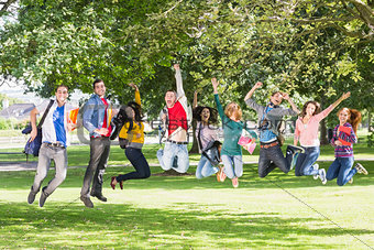 College students jumping in the park