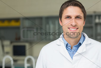 Close up portrait of a smiling male doctor