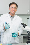Male researcher carrying out experiments in the lab