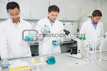 Group of scientists working at the lab