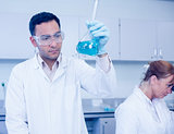 Male researcher experimenting in the lab