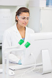 Female researcher using a computer in the lab