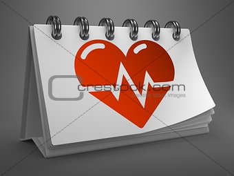 Desktop Calendar with Icon of Heart Cardiogram.