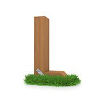 Wooden letter L in the grass