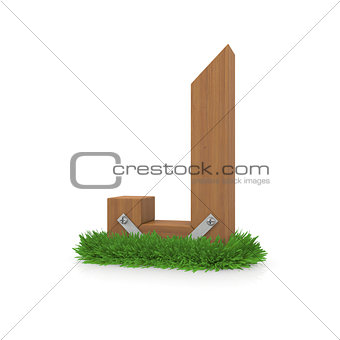 Wooden letter J in the grass