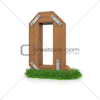 Wooden letter Q in the grass