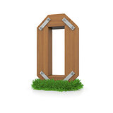 Wooden letter O in the grass
