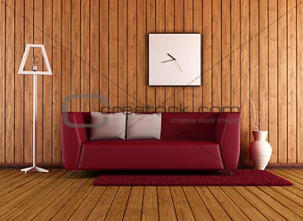 wooden living room with red couch