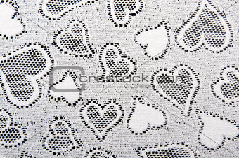 white lace patterned with hearts