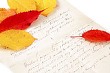 handwritten letter with autumn leaves