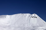 Off-piste slope with trace of skis, snowboarding and avalanche
