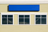 Blank Blue Sign Outside Commercial Building