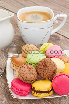 plate of  macaroons  with coffee