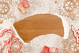 Christmas background with Candies, snowflackes and decotative Ch