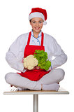Smiling cook with cabbage and lettuce