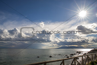 Sun and clouds in the bay of Malaga