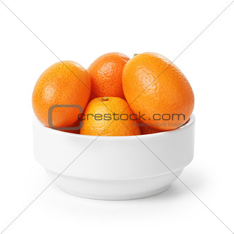 ripe kumquat fruits in bowl