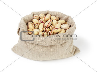 roasted salty pistachios nuts in sack bag