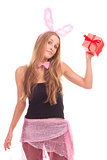A girl dressed as a rabbit with gifts