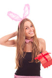 A girl dressed as a rabbit with gifts