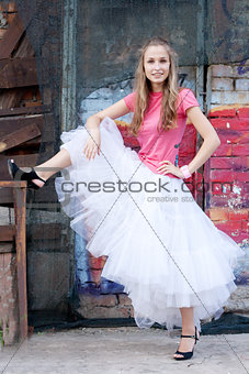 girl in white skirt and pink T-shirt