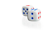 two white dice stand  on a white background