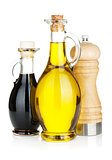 Olive oil and vinegar bottles with pepper shaker
