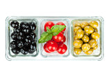 Black and green olives and tomatoes with basil