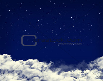 Clouds and stars in a night blue sky