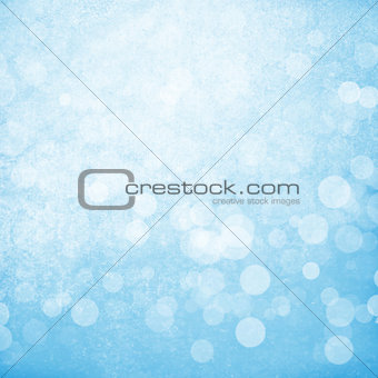 Blurred bokeh nature background with snow flakes