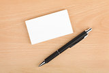 Blank business cards and pen
