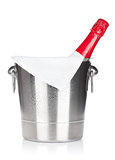 Champagne bottle in ice bucket