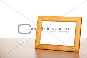 Photo frame on wood table
