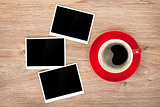 Cup of coffee and three photo frames