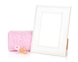 Photo frame with bath towel and girl dummy