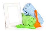 Photo frame with bath towel and toys