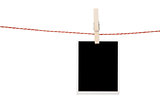 Blank photo hanging on clothesline