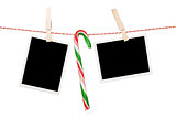 Blank photos hanging on clothesline