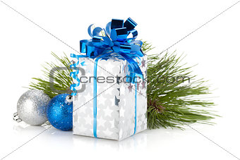 Christmas gift box and blue baubles