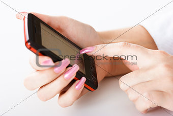 Mobile phone in women hand