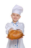 Smiling chef with a loaf of bread