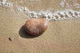 Single pebble on the beach