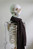 skeleton wearing scarf