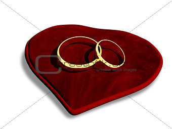 wedding rings on a red cushion