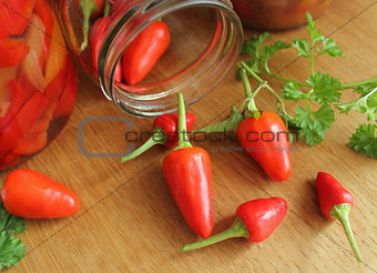 red chili peppers on wooden table