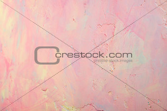 Wall with pink and yellow texture
