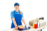 Teen Cashier Serves Fast Food
